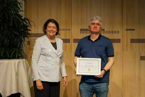 Yuri Musienko receiving citation award at CMS CERN