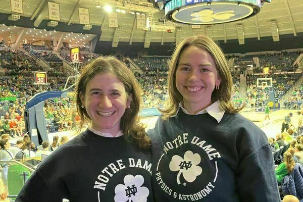 Prof. Weiss and Deegan at the 2026 STEM night with NDWBB